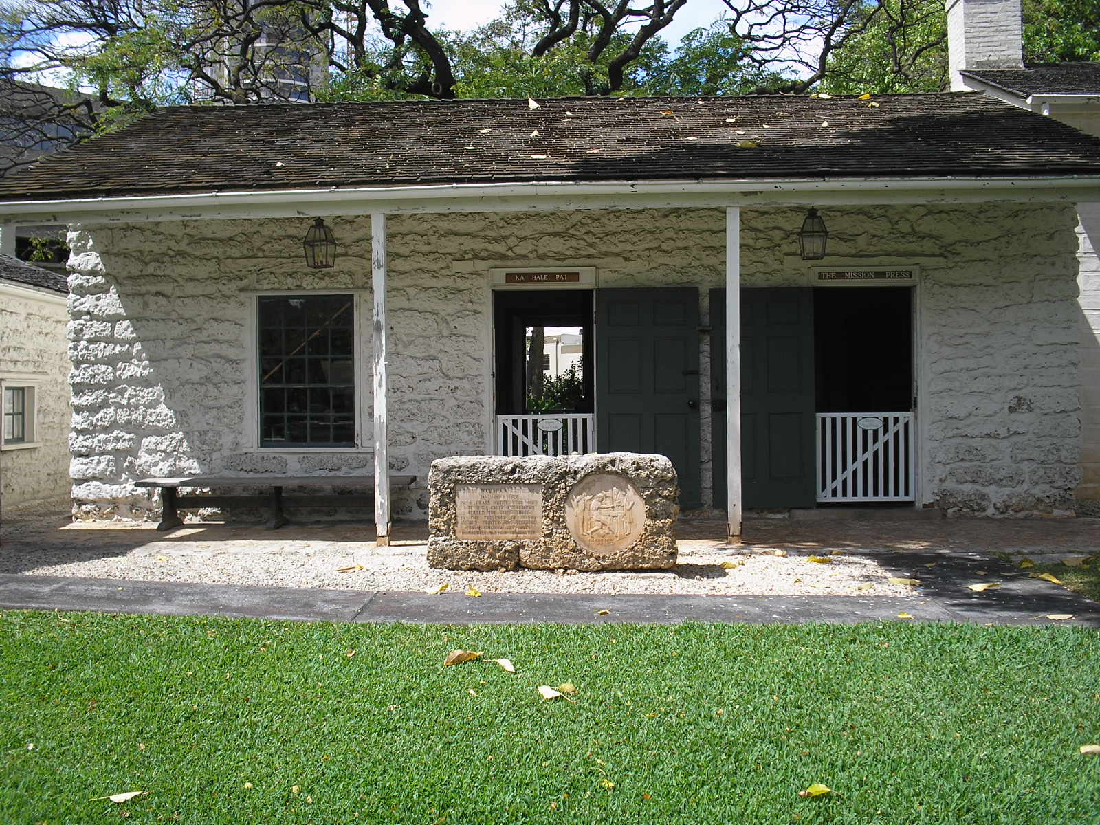 Replica printing press at Hawaiian Mission Houses Printing House, showing the wooden hand-cranked press