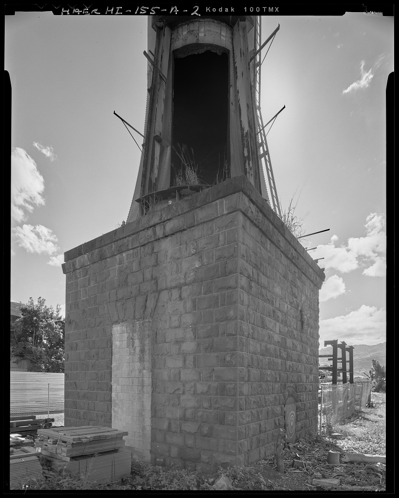 Smokestack base with stone masonry and sealed doorway