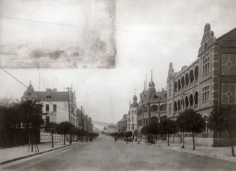 广西路1910年代街景，路面宽阔，两侧建筑高度统一