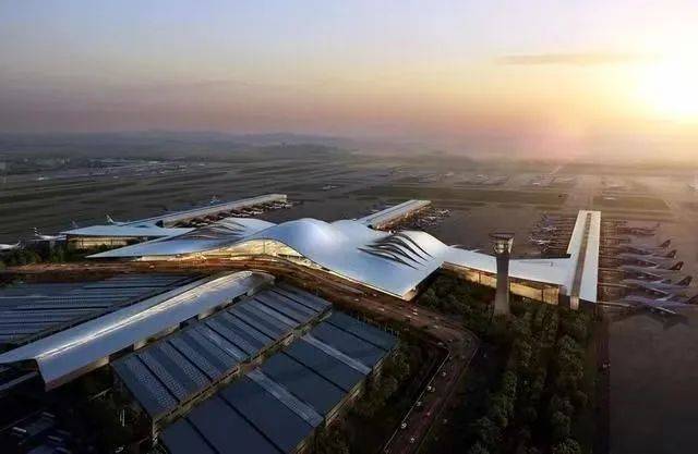 迎宾路视角的机场全景，T4新航站楼在前景、T3在远处