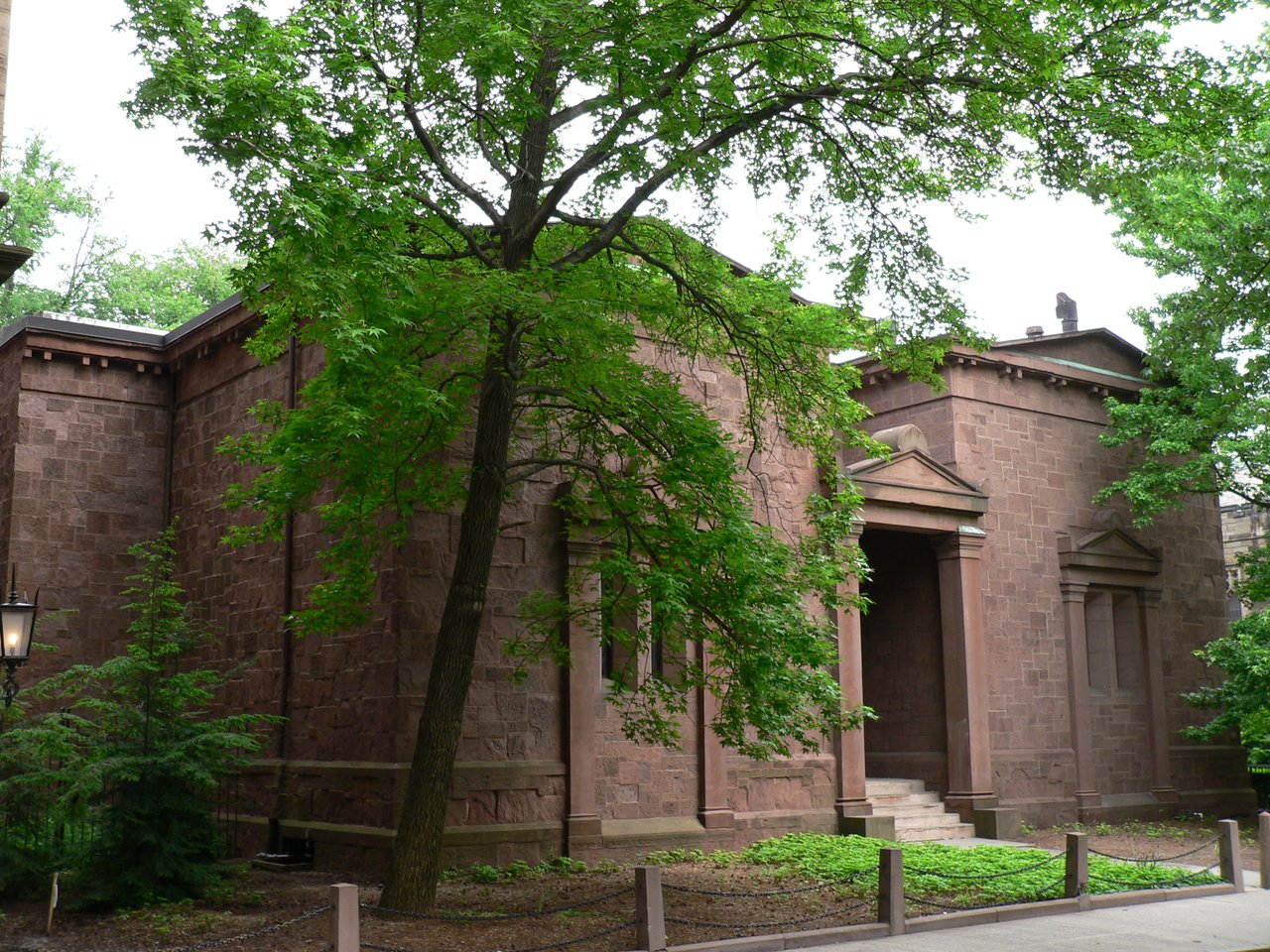 Yale Skull and Bones facade from an angle, showing the heavy door frame and Doric columns