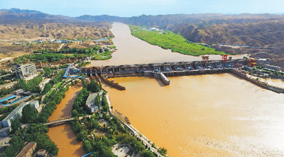 An aerial view shows the Qinglong Gorge Hydropower Hub and the Yellow River Dam 